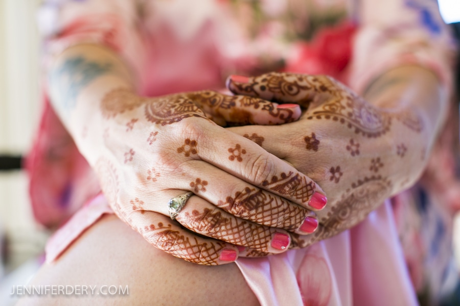 photo mehndi on hands at a non-indian wedding