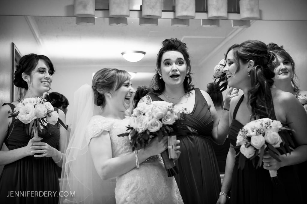 black and white photo of bridesmaids being silly