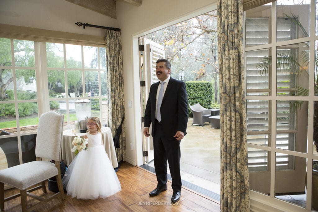 dad's first look at the bride. standing at the door of one of the casitas at rancho bernardo inn