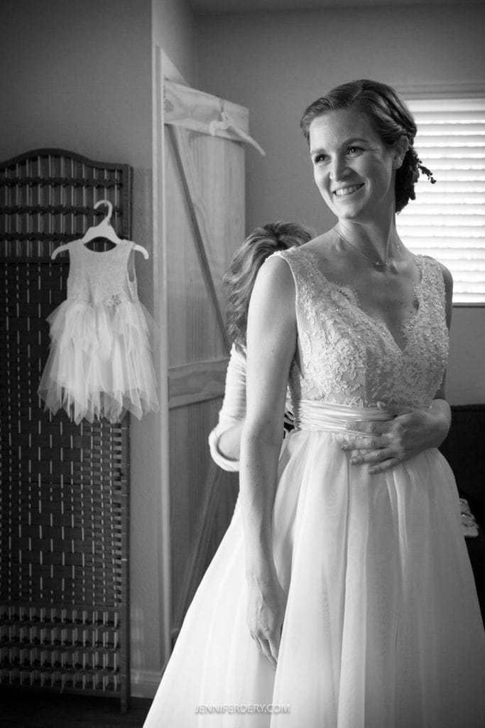 bride getting ready at a wine wedding in temecula, ca.