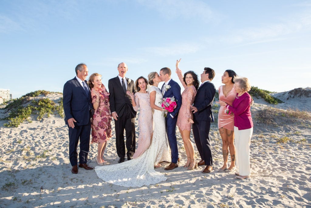 example of artificial lighting for an article about getting stargeted as a photographer. example is for a group wedding photo at the beach at the coronado sand dunes.