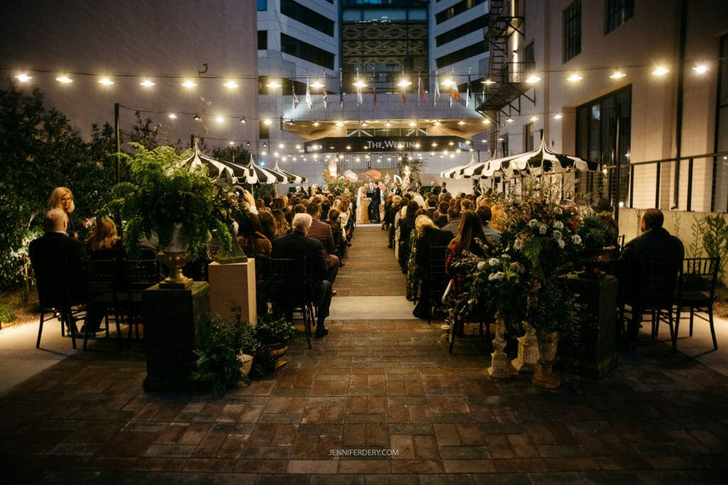 Wedding Photography photo showing a ceremony at night and outside. 