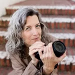 wedding photographer Jennifer Dery shown in presidio park with her camera