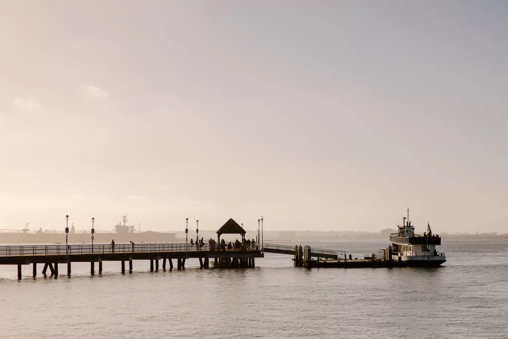 watching sunset during some self-employed boundaries free time in coronado. photo of the ferry landing on the island in san diego