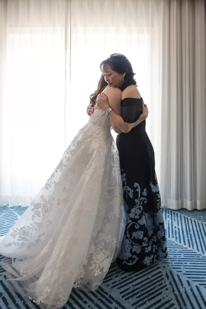 photo of bride hugging her mom