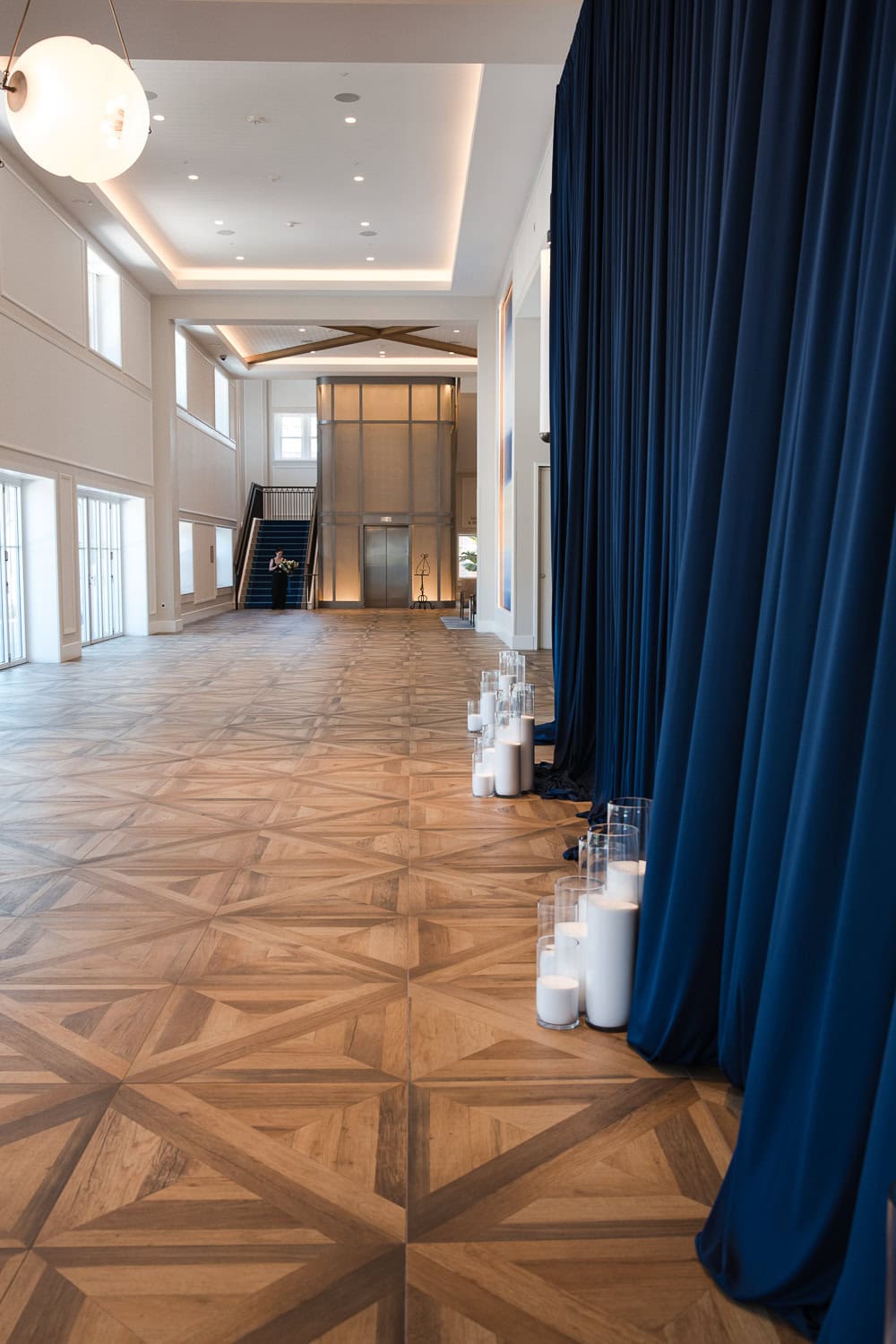 Foyer of Southpointe Ballroom event center navy and white candle decor for entrance