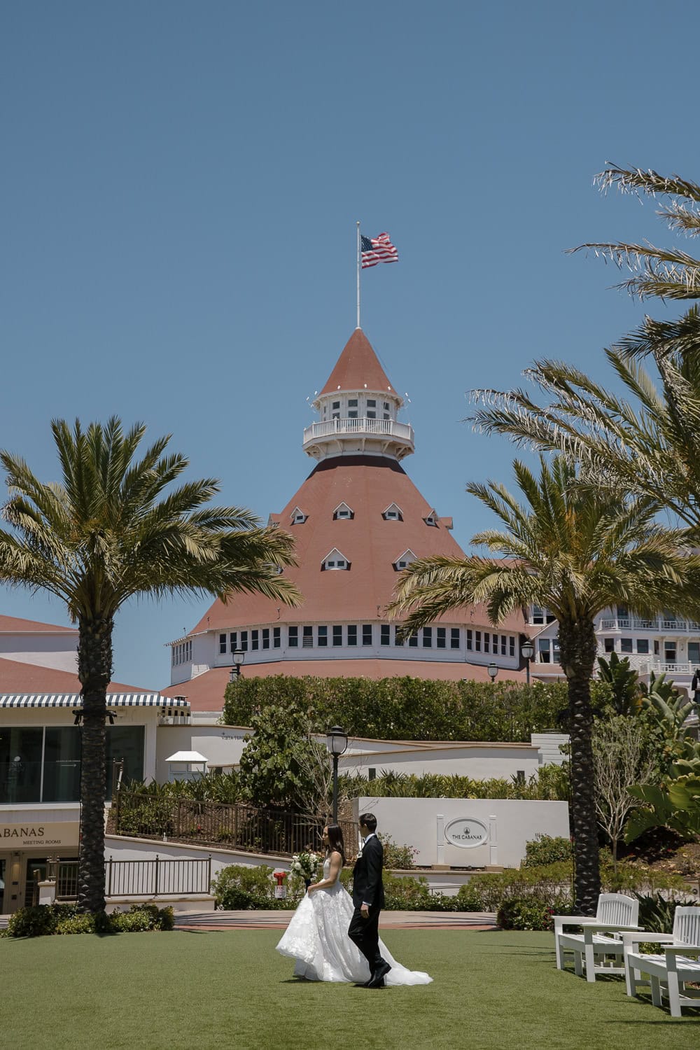 outside Southpointe Ballroom event center with wedding couple at the Hotel Del Coronado