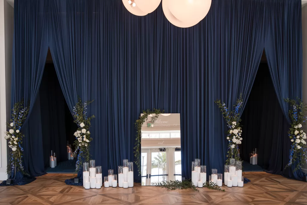 Southpointe Ballroom Wedding navy and white with candles and mirror decor for wedding reception entrance